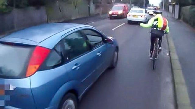 Cyclist Filming a Motorist