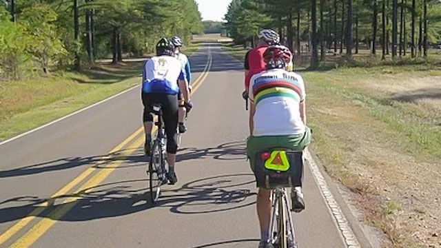 Cyclists riding two abreast